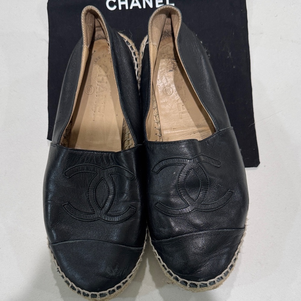 Chanel black lambskin leather espadrilles featuring the iconic CC logo